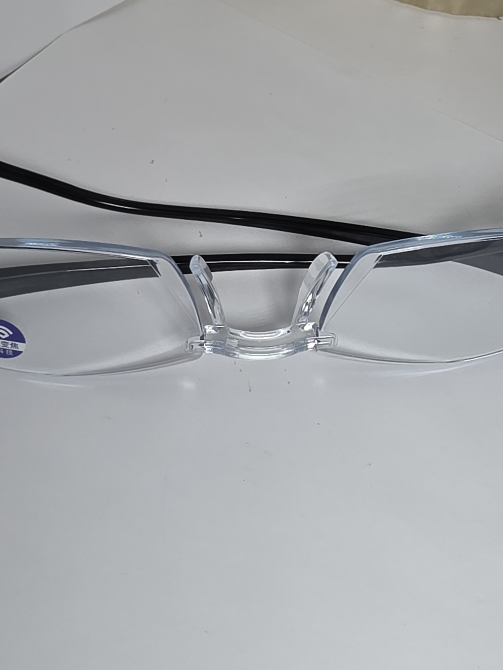 Women’s Clear Frame Blue-Tinted Rimless Sunglasses